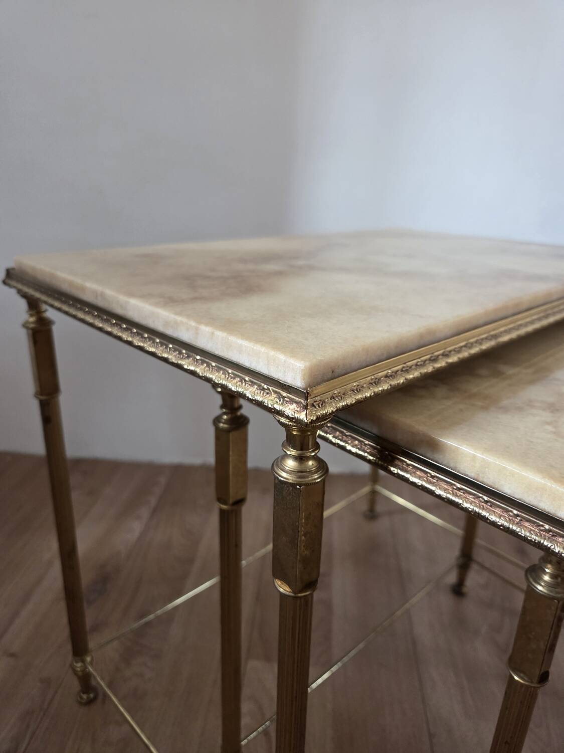 Nested tables in brass and marble, 1950.