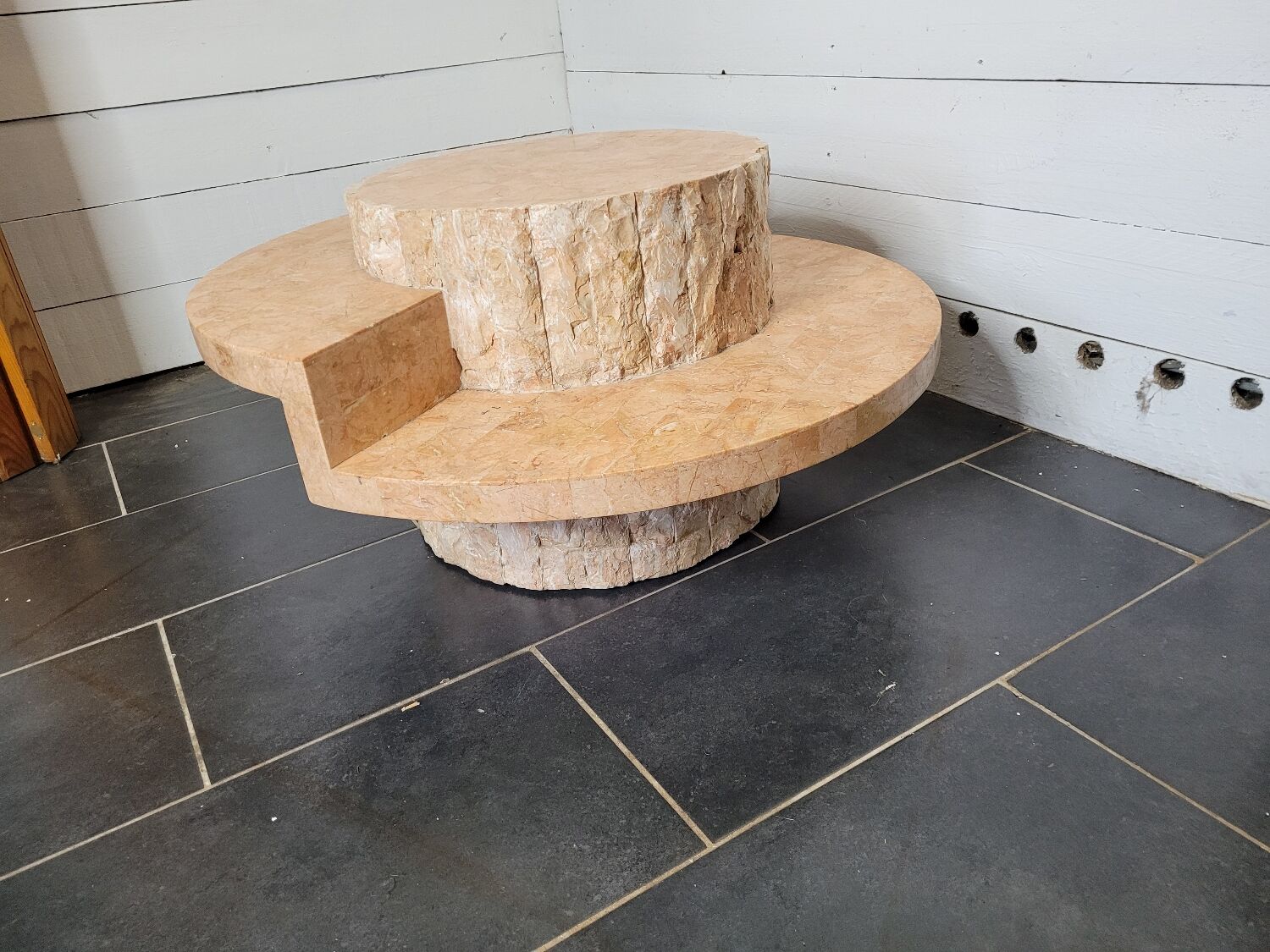 Round stone coffee table by Magnussen Ponte