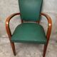 Green faux leather bridge chair