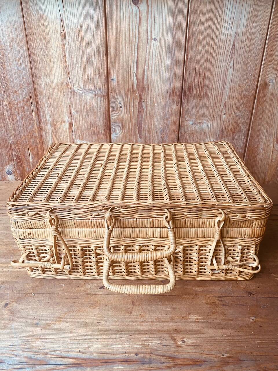 Vintage rattan suitcase