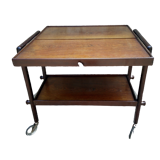 Table serves with removable tray mechanism year 50