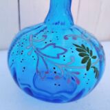 Vintage twisted blue glass carafe with enamel decoration.