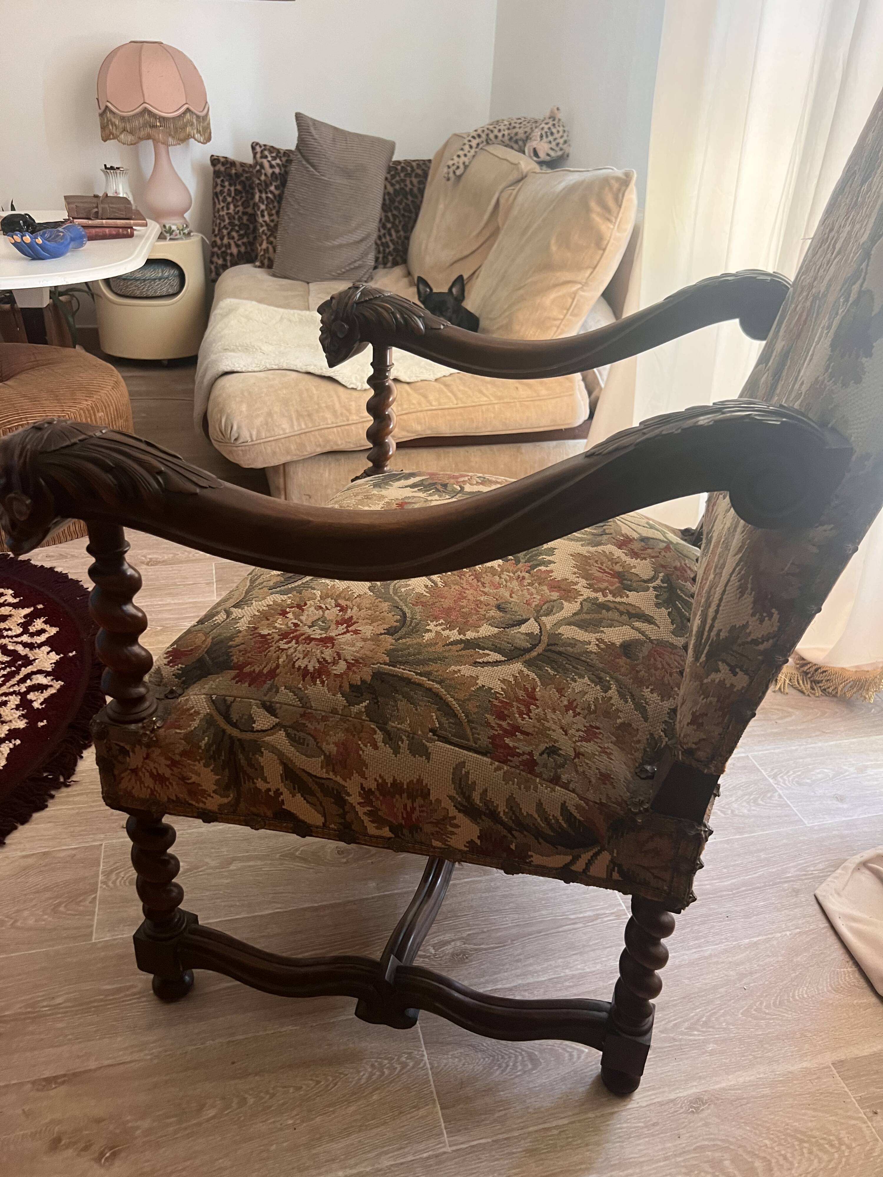 Antique armchair in Henri II style with masks