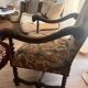 Antique armchair in Henri II style with masks