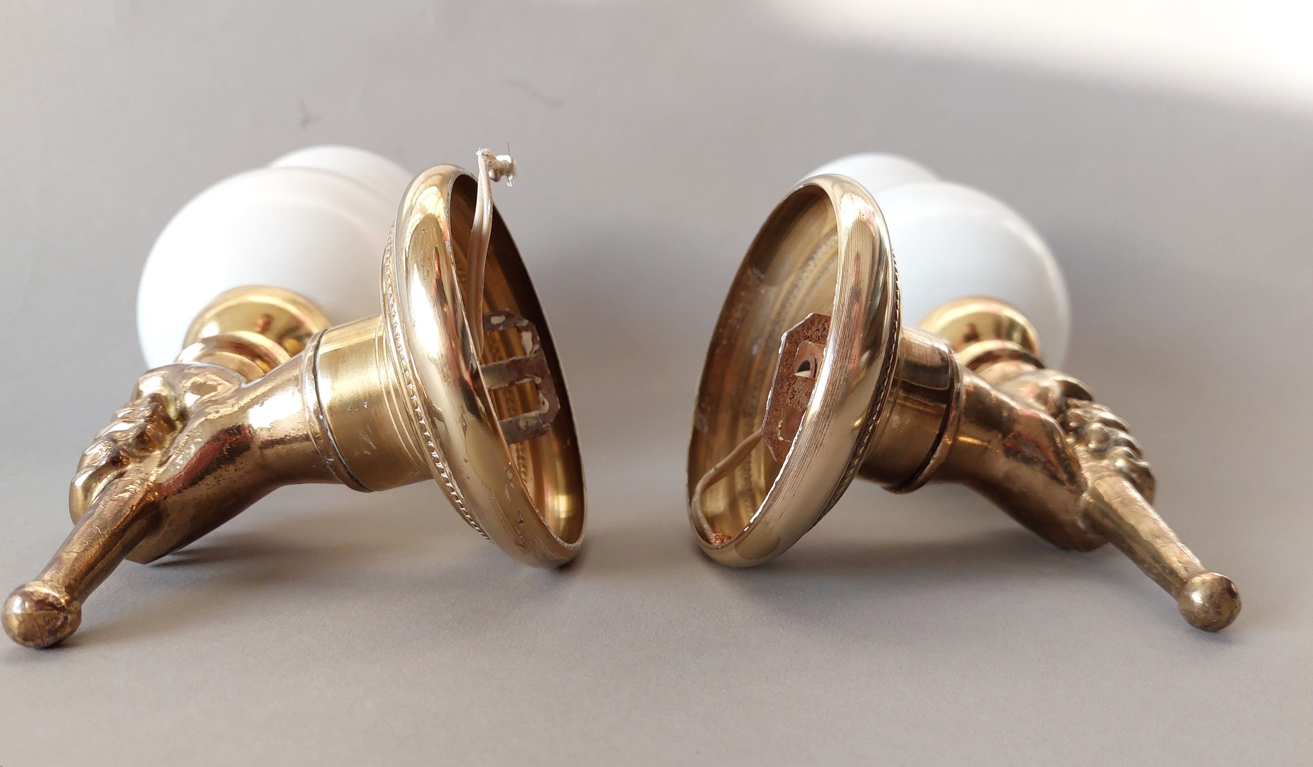 Pair of bronze and gilded brass sconces by John Devoluy 1950.