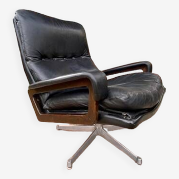 Black leather armchair by André Vandenbeuck circa 1960