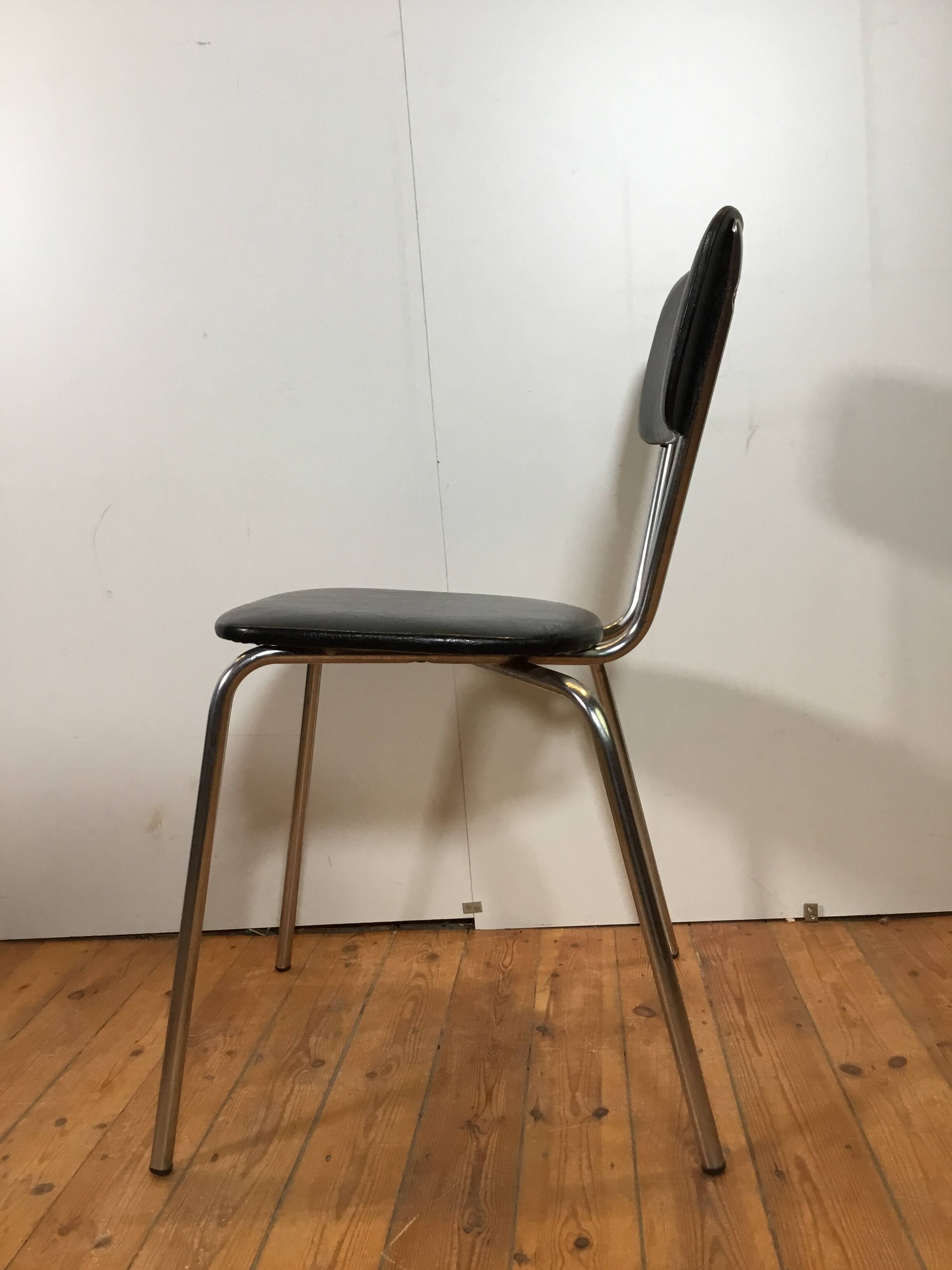 vintage chromed tubular steel stackable dining chairs