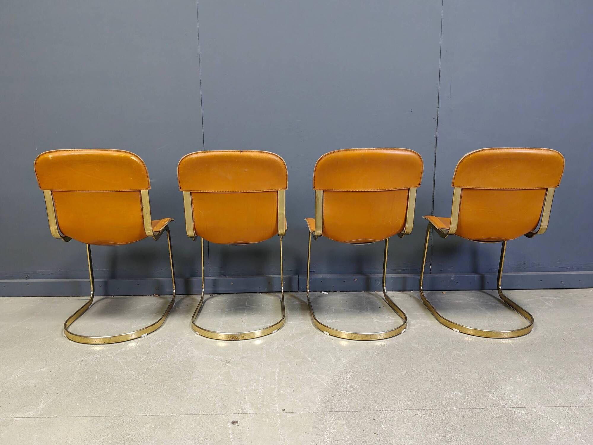Vintage brass and cognac leather dining chairs by Willy Rizzo for Cidue set of 4