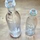 2 old graduated pharmacy bottles