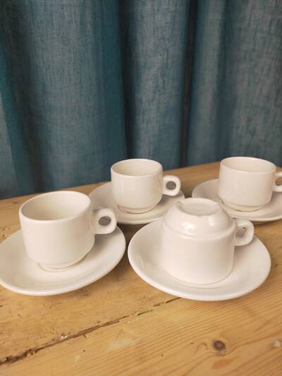 4 fours and 4 bistro coffee saucers