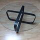 Design round glass coffee table, crossed legs