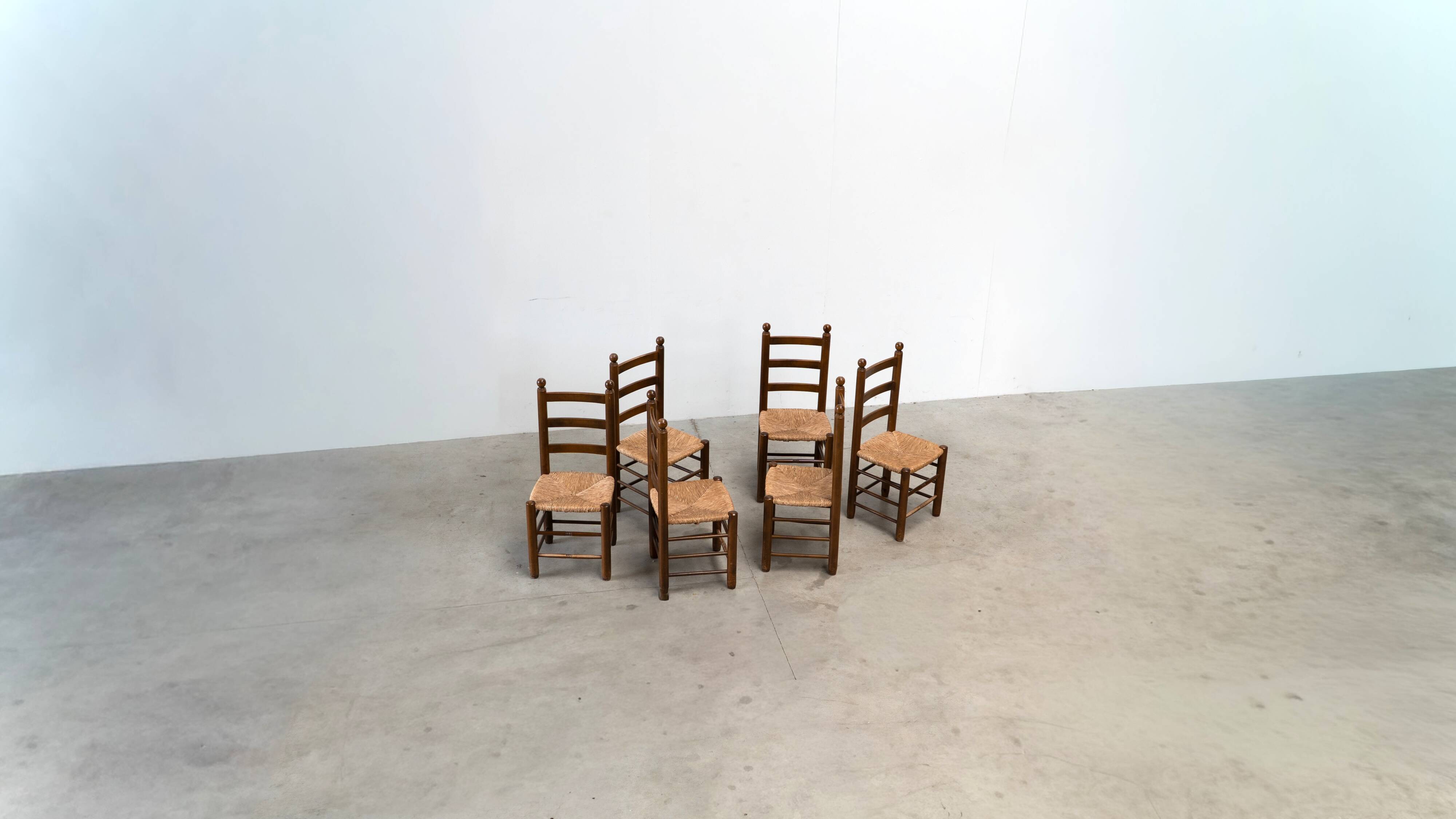 Ensemble de six chaises de salle à manger françaises par Charles Dudouyt