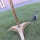 Twisted brass tripod floor lamp