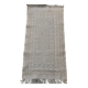 Hand-woven rug in natural wool