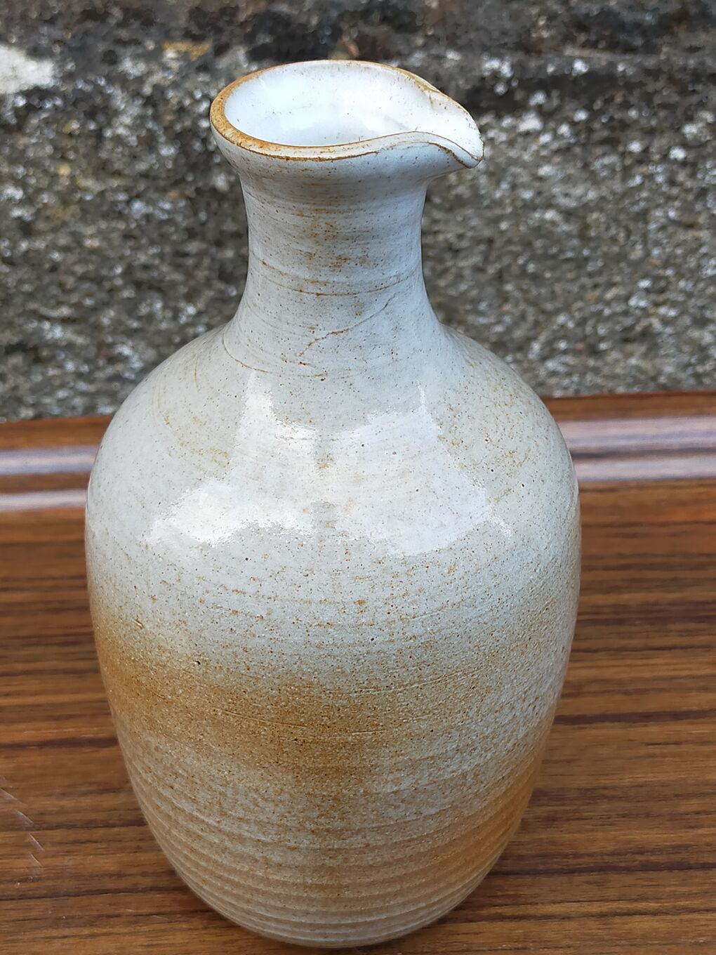 Light stoneware potter's bottle with vintage spout