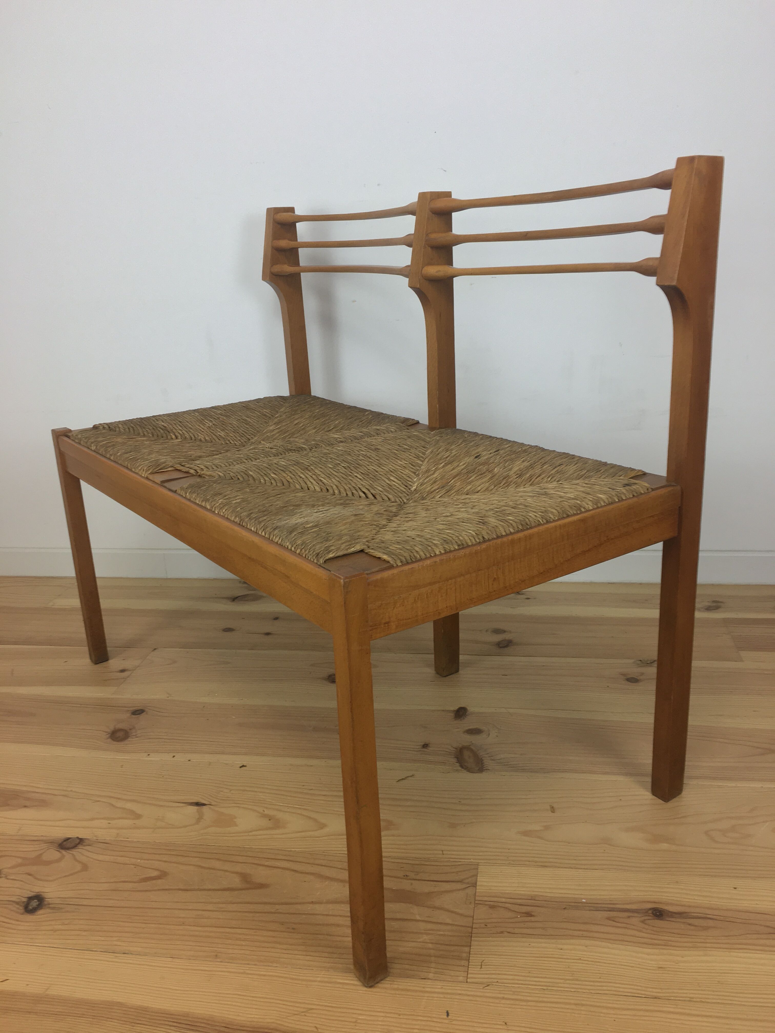 Wooden mulched modernist bench in 1950s