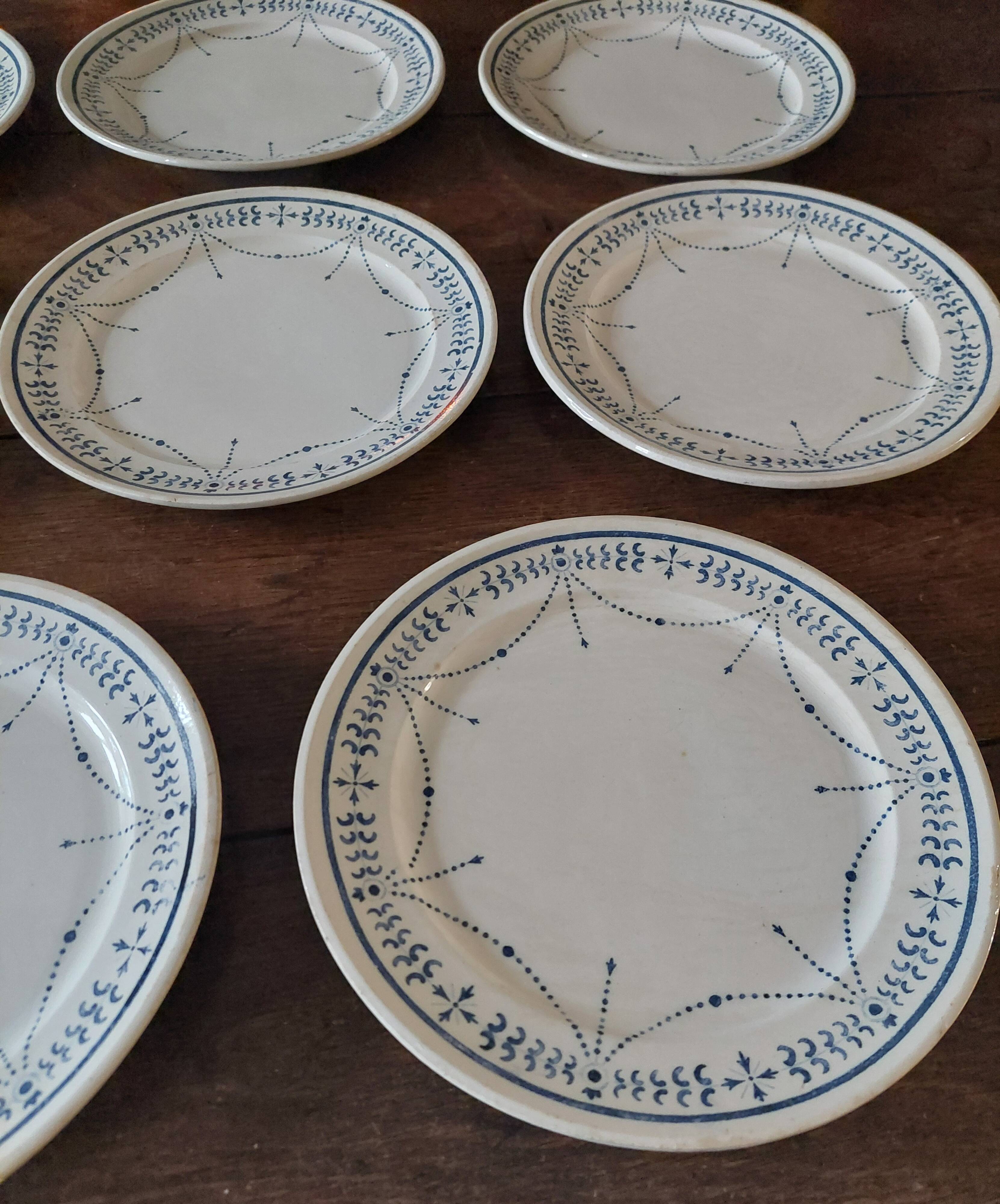 Set of eight flat plates, ironstone, Géon Rouard, Lille decoration, years.