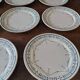 Série de huit assiettes plates terre de fer Géon Rouard décor Lille années