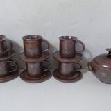 coffee service in iridescent stoneware cups and vintage sugar bowl