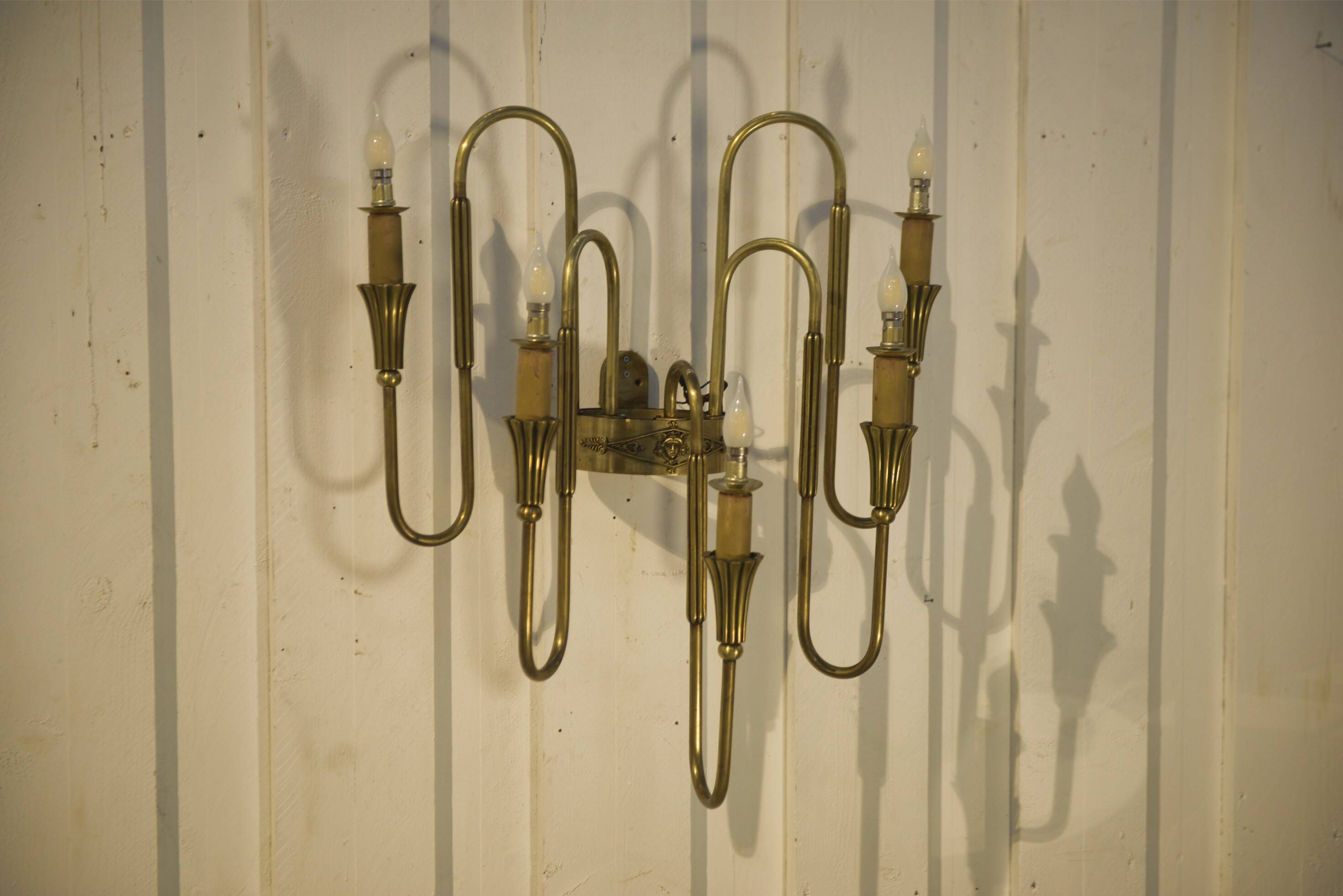 Monumental bronze wall light with 5 arms, neoclassical Art Deco from the 1940s.