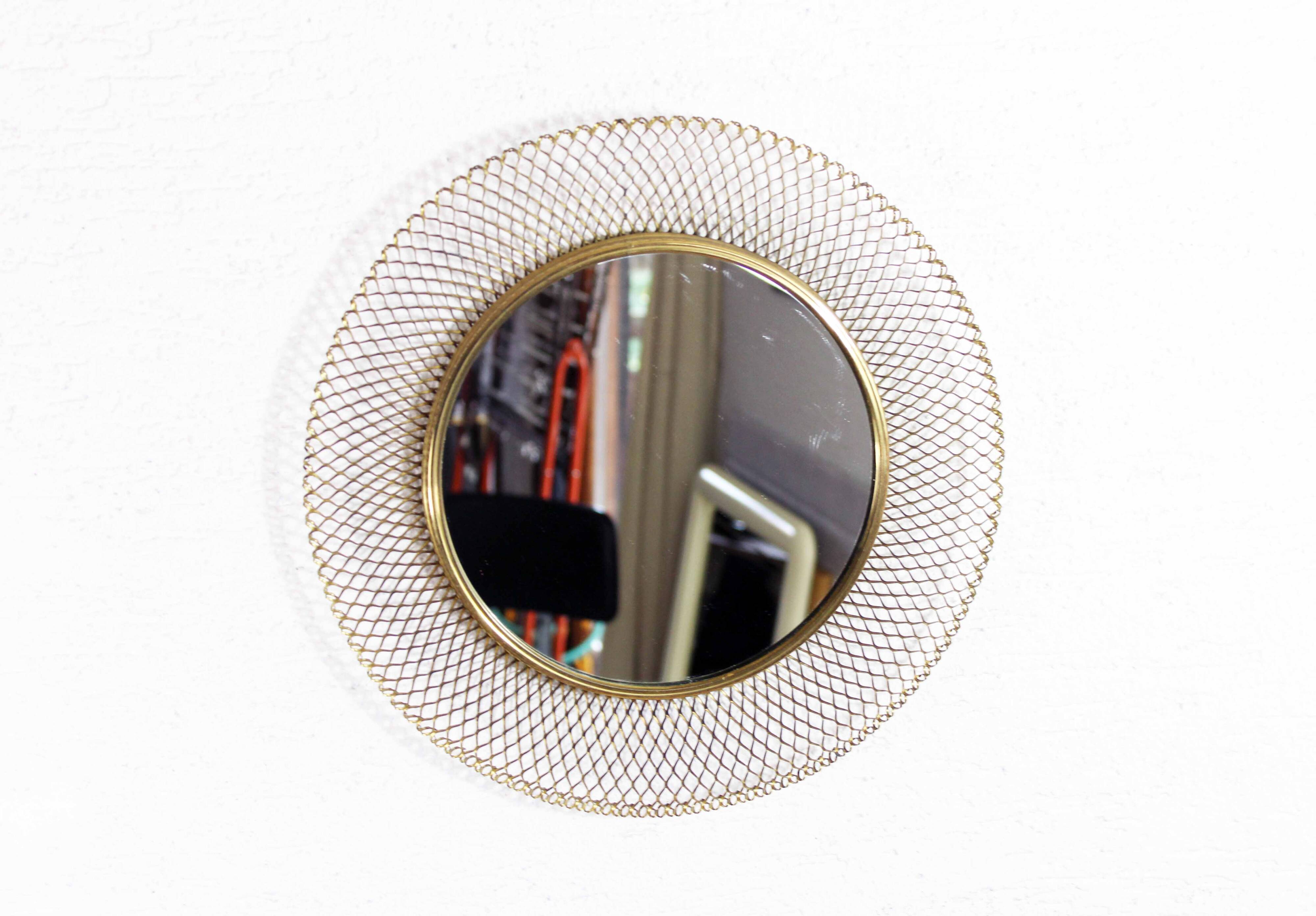 Round gold metal mirror
