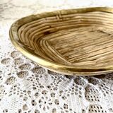 Empty rattan and brass pocket