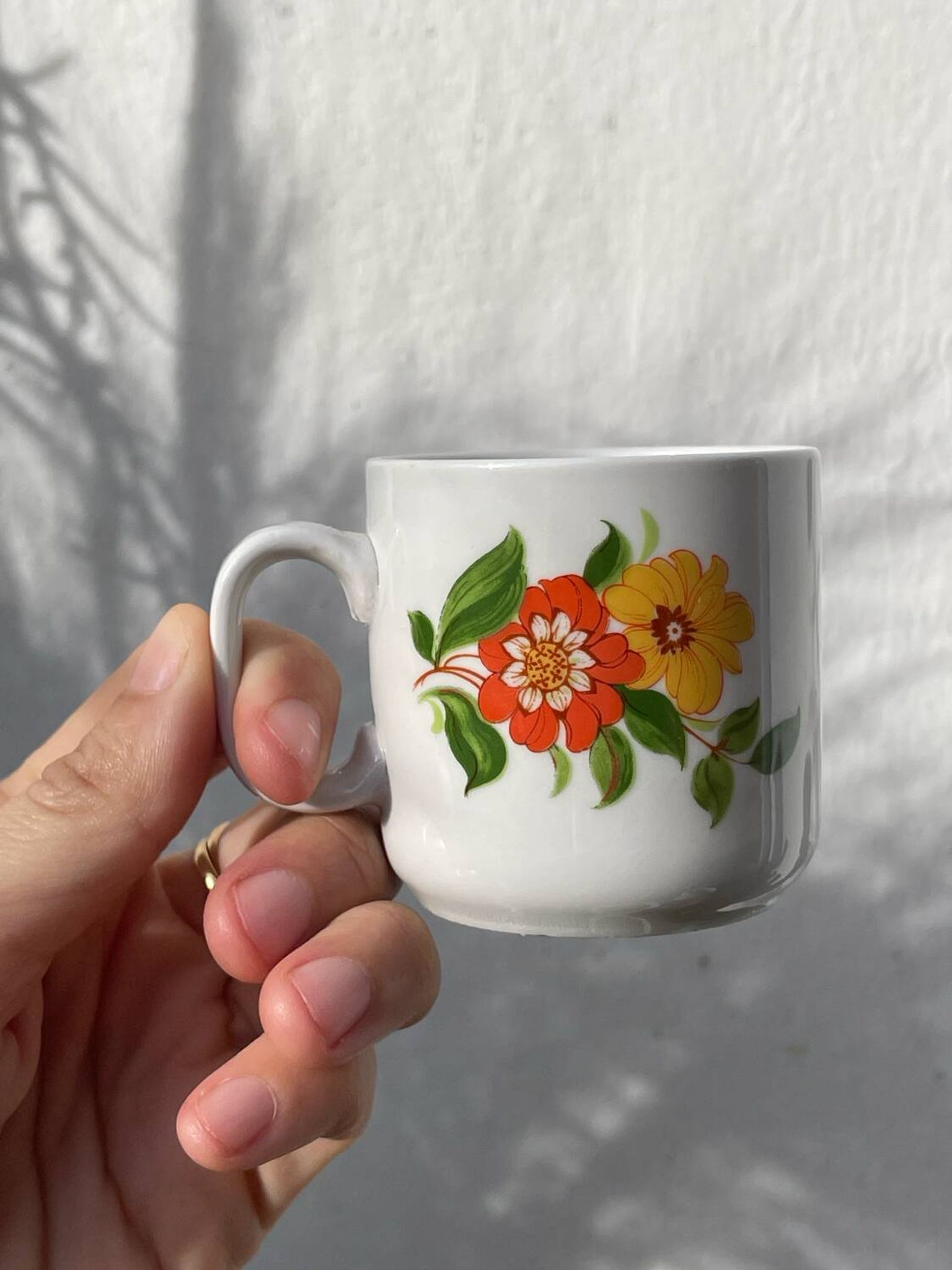 12 porcelain coffee cups with flowers, 1960s-1970s