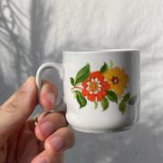 12 porcelain coffee cups with flowers, 1960s-1970s