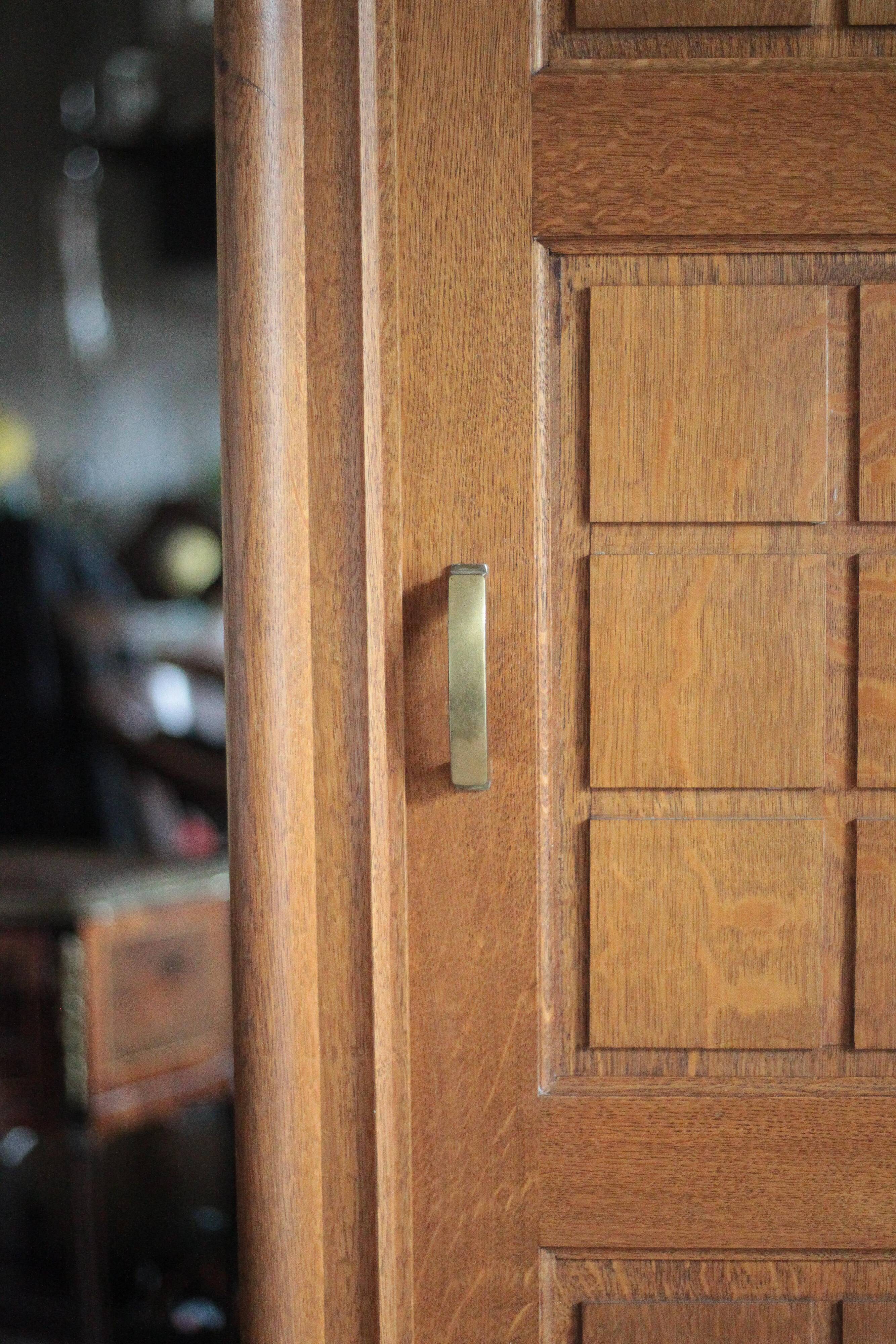 Vintage wooden wardrobe with sliding doors.