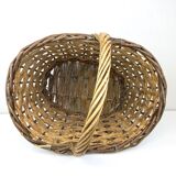 Large braided basket of different types of strands