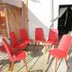 Lot de 6 chaises skaï rouges 1960 style scandinave