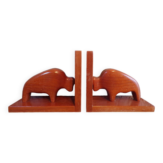 Pair of teak bookends in the shape of a bison