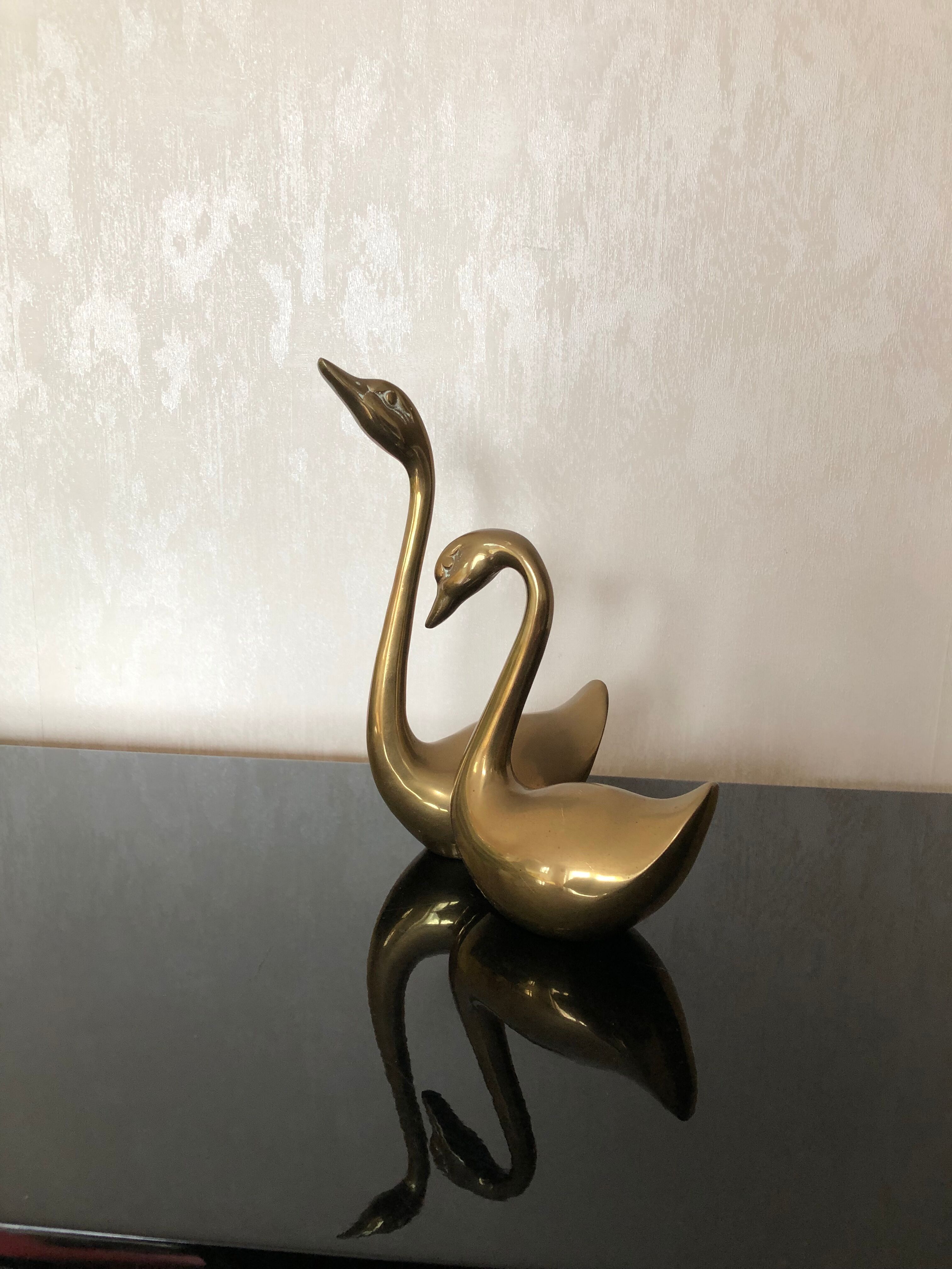 Brass swans