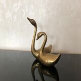 Brass swans