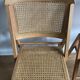 Pair of folding chairs in caning