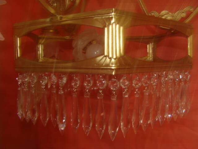 Art Deco period chandelier (1925) with four light arms.