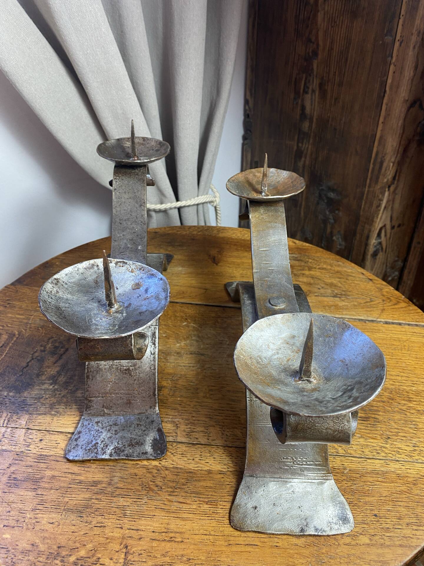 Brutalist wrought iron candlestick pair