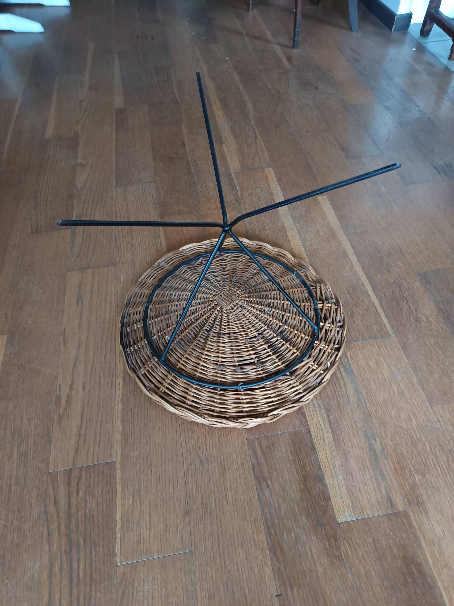 vintage wicker gueridon with a black metal tripod base from the 1960s