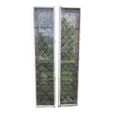 Paire de double portes anciennes à vitraux. Cadres métalliques. Fenêtres vitrail