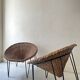 Italian sunflowers armchair in rattan and black metal, 1950s design.
