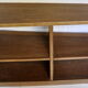 Asymmetric shelf