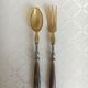 Old salad cutlery in horn and silver metal