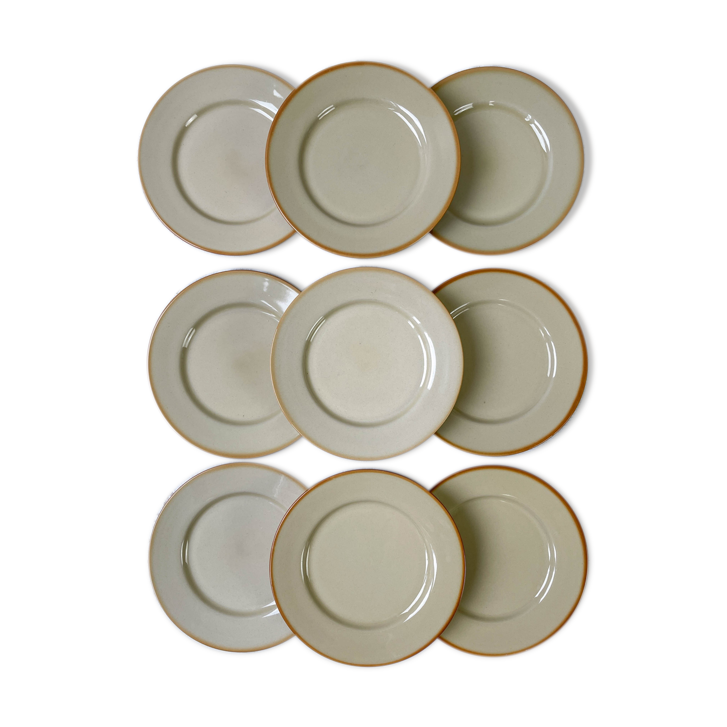 9 mid-century beige Tulowice stoneware plates