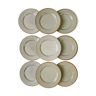 9 plates in beige Tulowice mid century stoneware