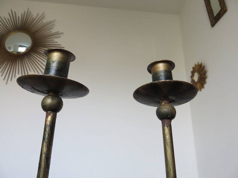 Pair of "sun" candlesticks in metal and wood from the 80s