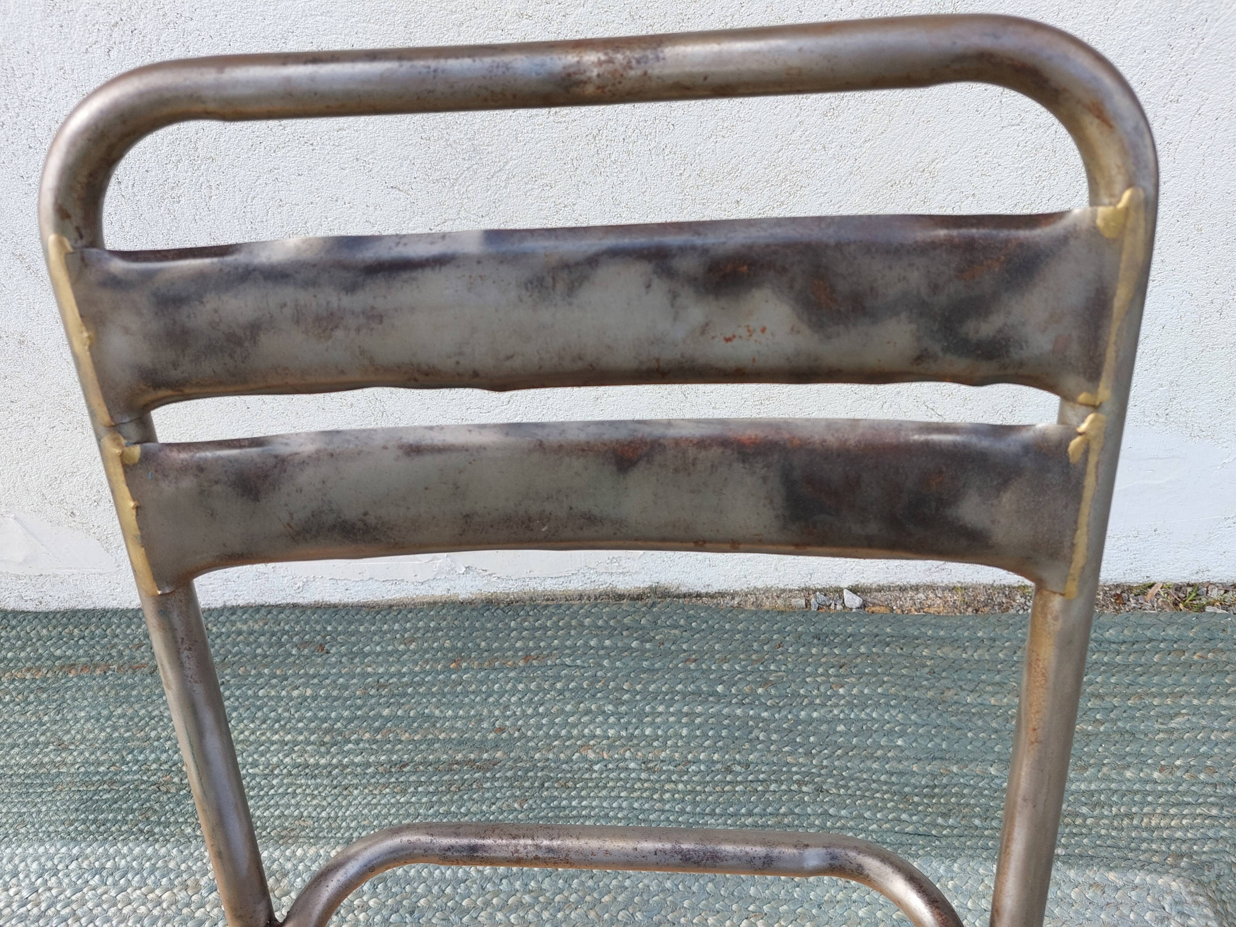 3 metal chairs, Tolix style