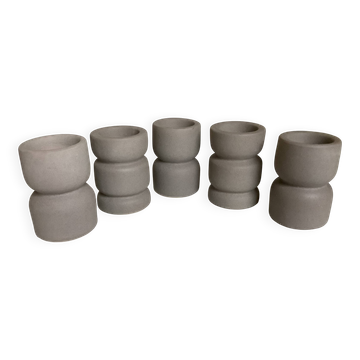 Five matte gray candle holders