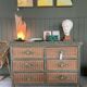 rattan chest of drawers with green details