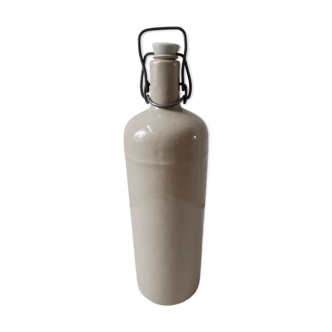 Vintage beige sandstone bottle