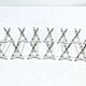 12 silver-plated metal knife handles, in a case.